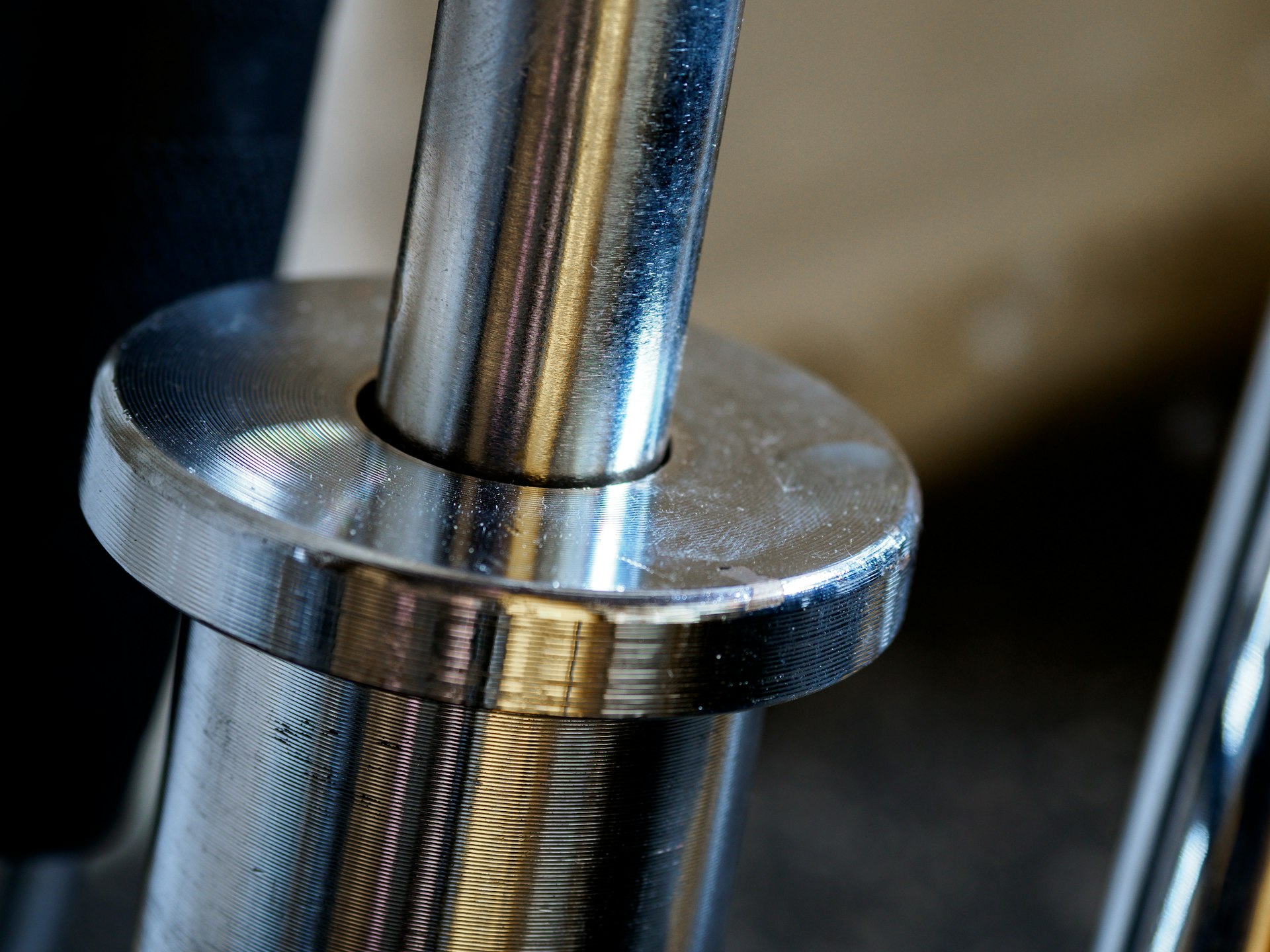 silver and gold steel tube
